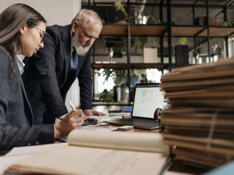 How does AI into ERP and CRM with Dynamics 365 enhance contract management